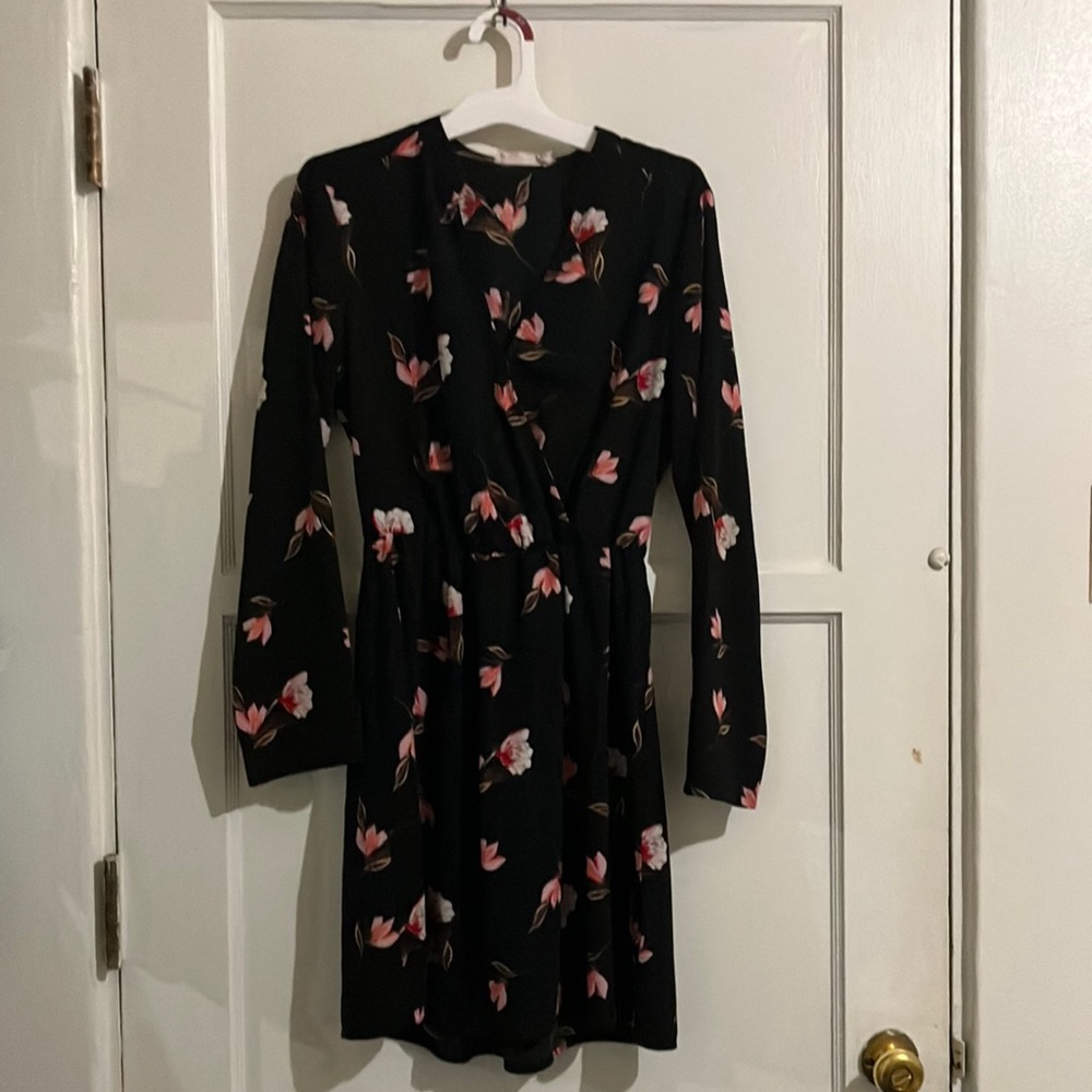 All in favor black dress with pink flowers.
